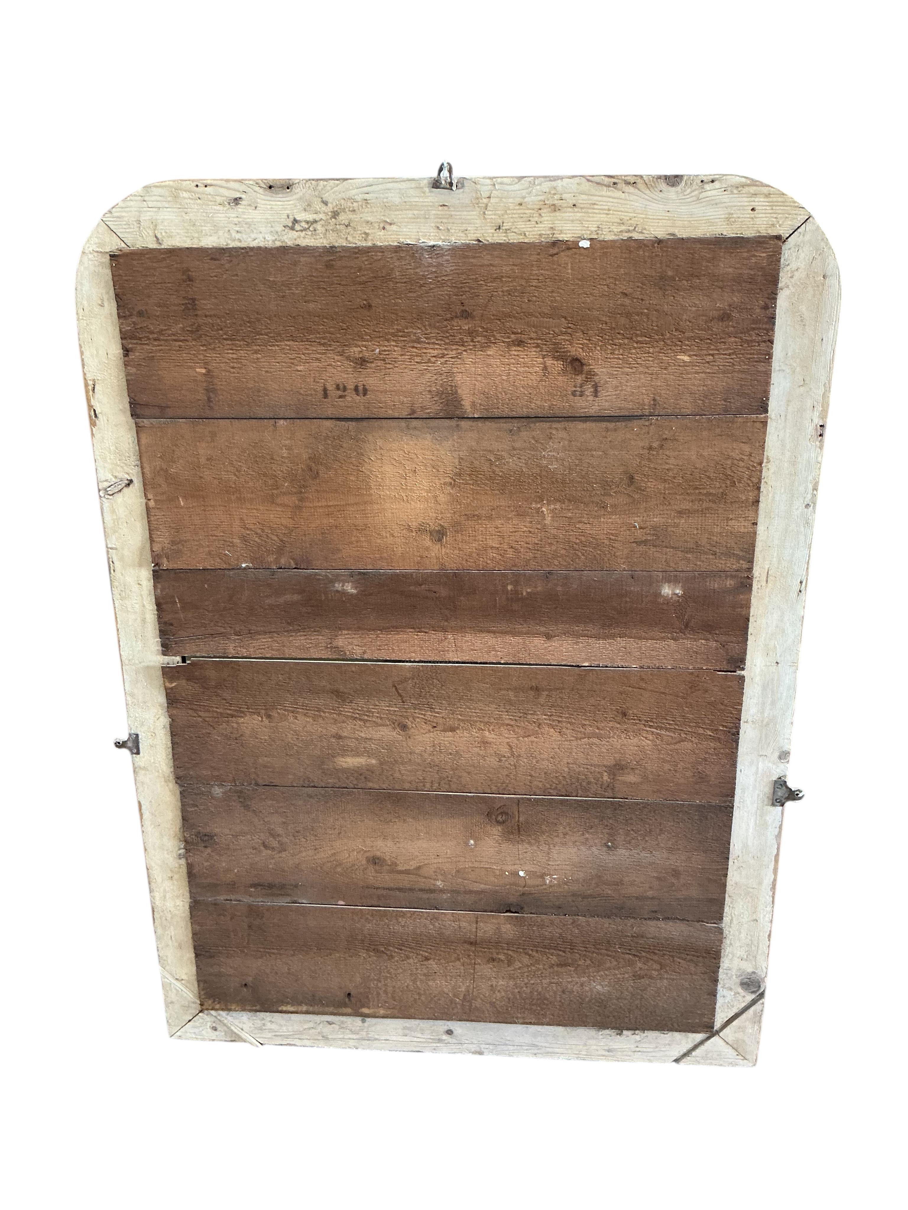 A Victorian pine overmantel mirror, width 102cm, height 138cm